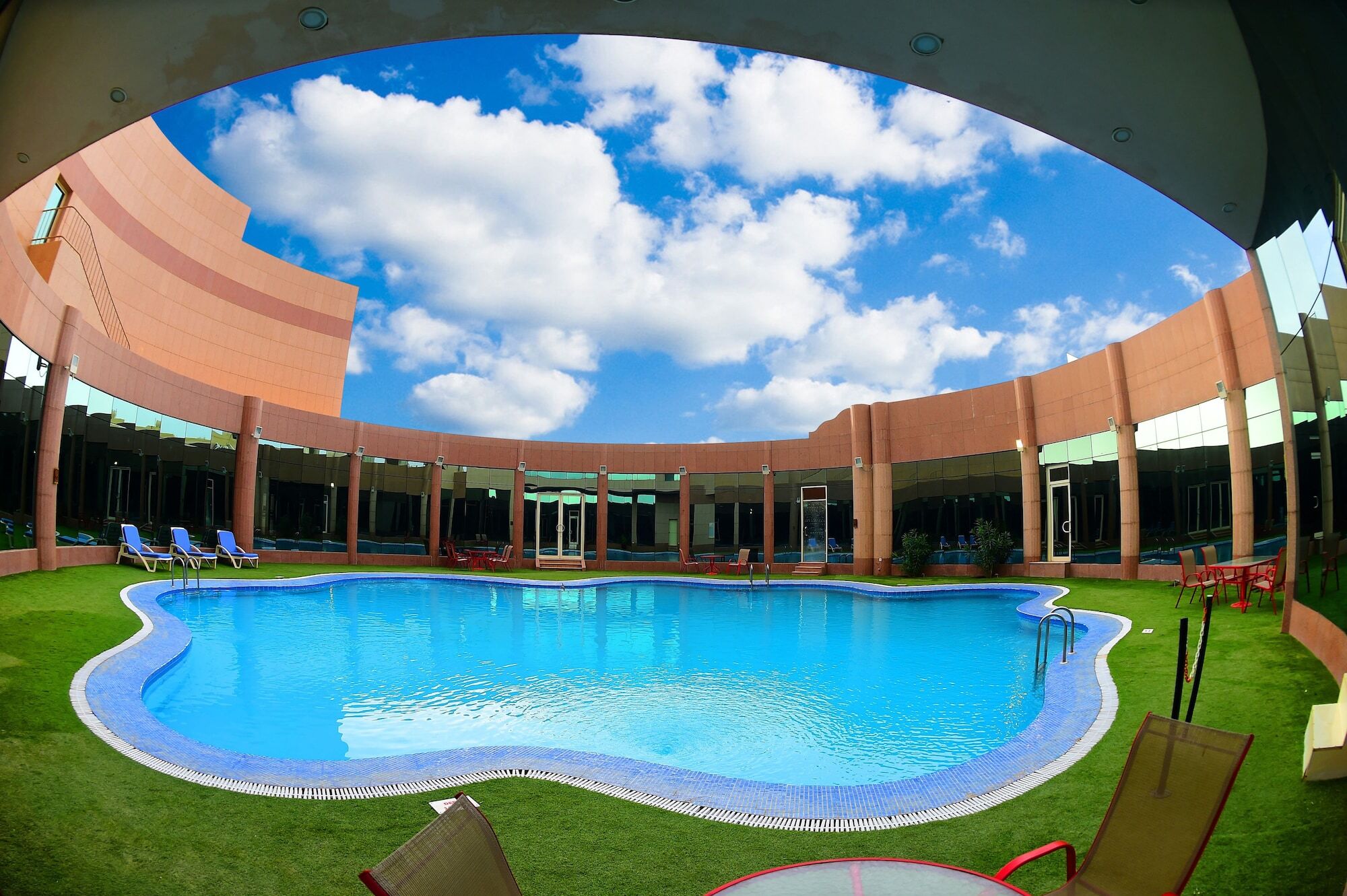 Ramada Hotel & Suites By Wyndham Al Qassim Al Bukayriah Exterior photo Swimming pool at the hotel