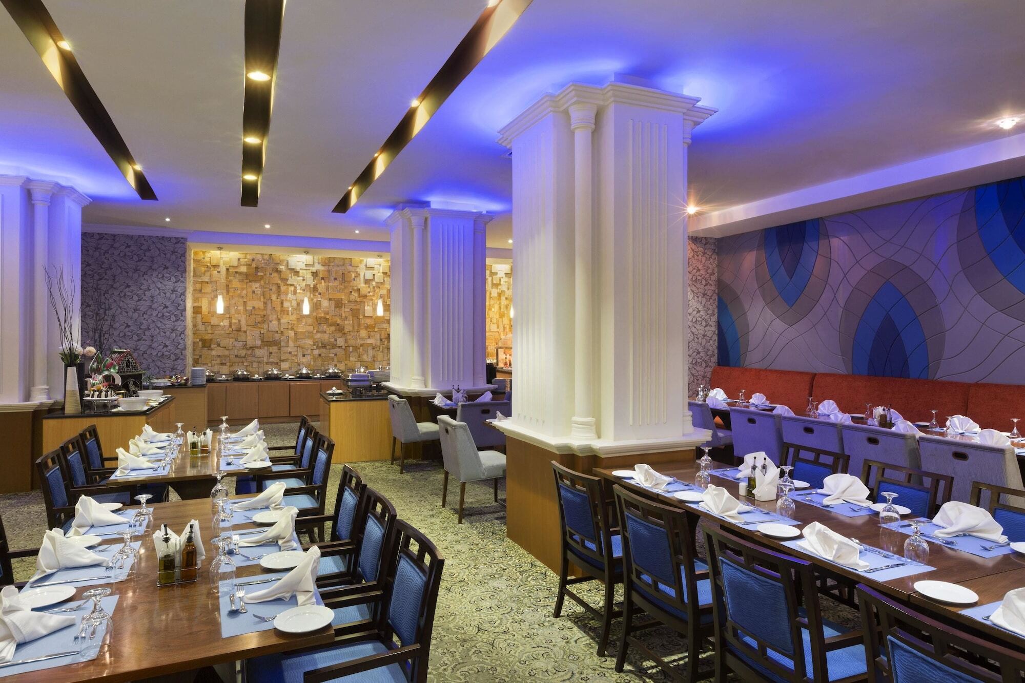 Ramada Hotel & Suites By Wyndham Al Qassim Al Bukayriah Exterior photo The restaurant